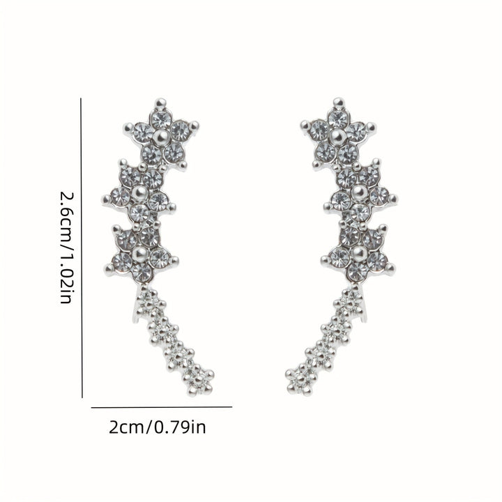 MARAIS | BOUCLES D’OREILLES FLORALES INTEMPORELLES