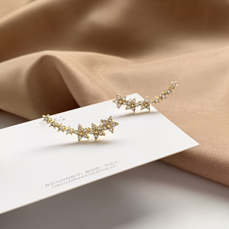 MARAIS | BOUCLES D’OREILLES FLORALES INTEMPORELLES