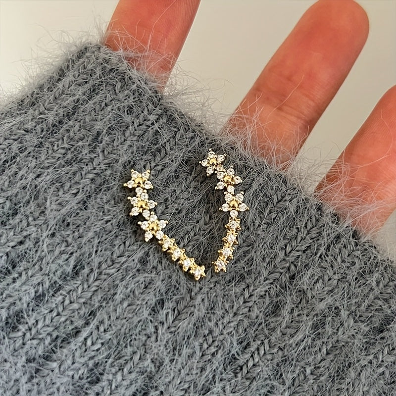 MARAIS | BOUCLES D’OREILLES FLORALES INTEMPORELLES