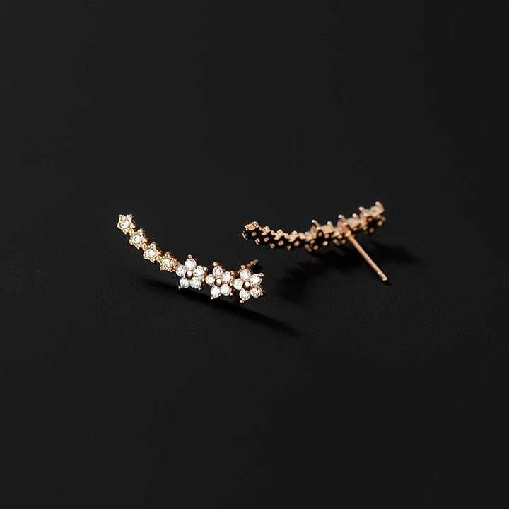 MARAIS | BOUCLES D’OREILLES FLORALES INTEMPORELLES