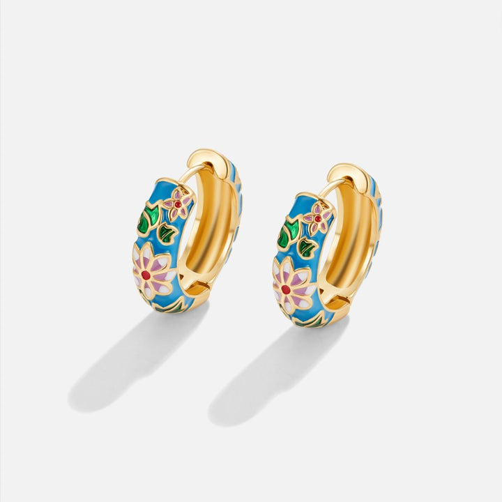 MARAIS | BOUCLES D’OREILLES EN CERCLE DORÉ AVEC FLEUR